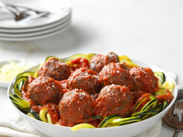 Place the marinara in a large pot along with the cooked meatballs over medium heat. Once the marinara starts bubbling, place the lid on top of the pot and turn down the heat to low. Allow to simmer for another 15 minutes.

These meatballs are great on their own or served over spaghetti squash or zoodles!

*Reference your nutrition guide for serving sizes*