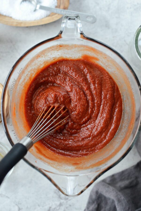 Add in tomato paste and mix thoroughly.